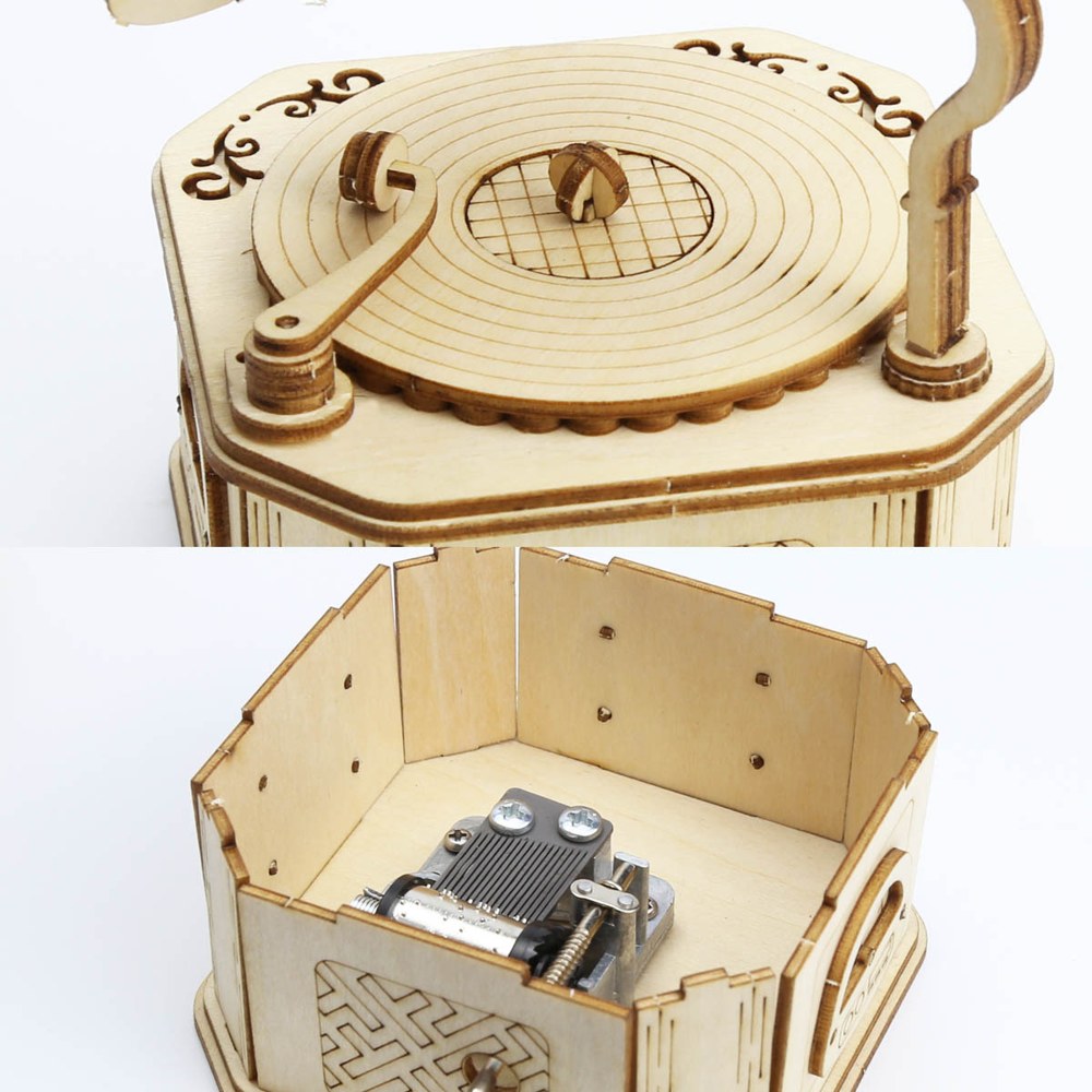 Plateau du gramophone en bois et mouvement musical logé dans le socle
