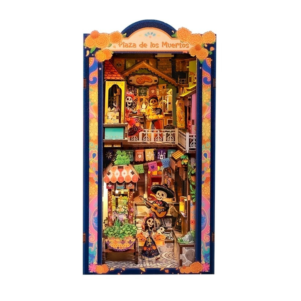 Book nook fête des morts mexicaine en bois vu de face, cadre bleu et soucis, sur fond blanc