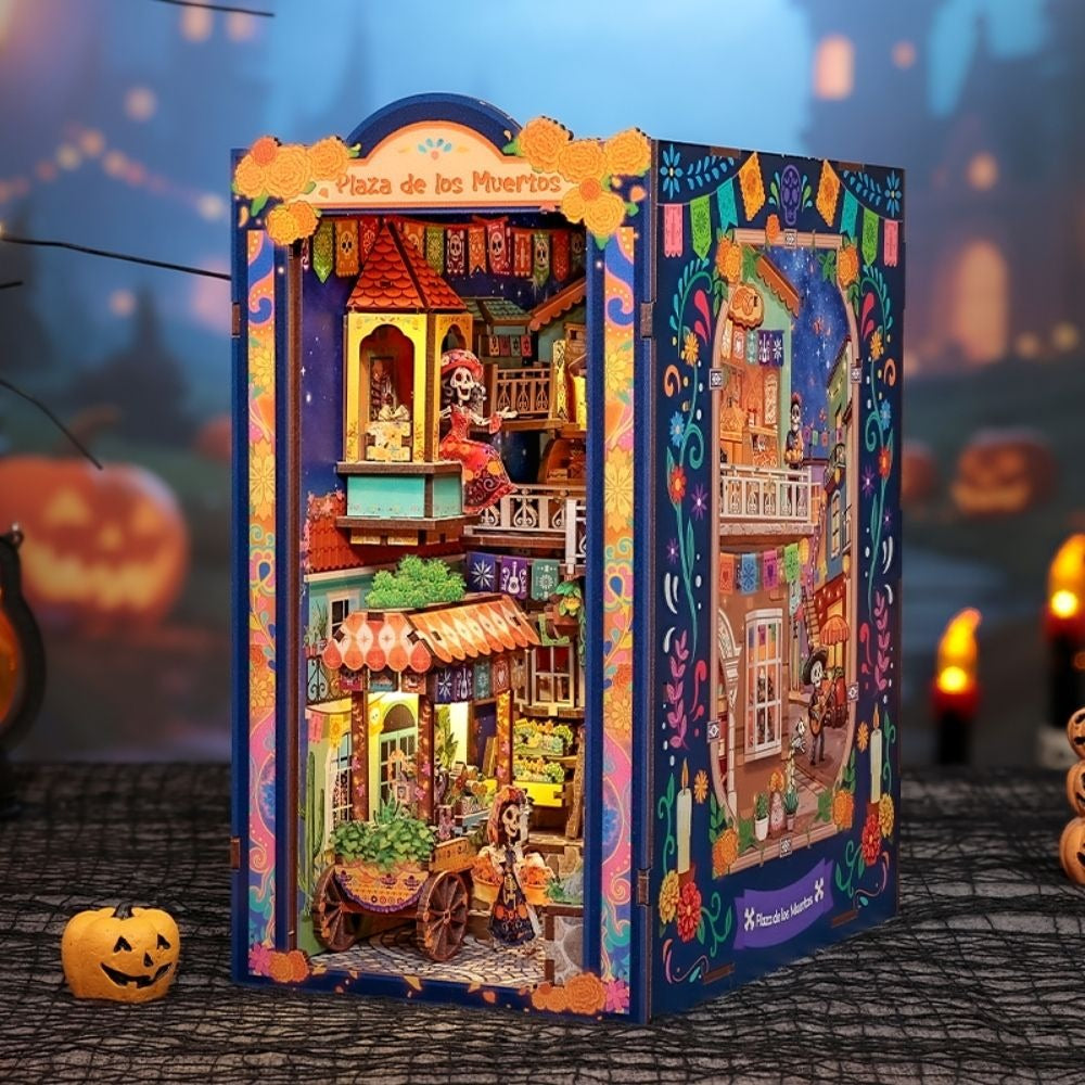 Book nook fête des morts mexicaine allumé la nuit, avec citrouille et bougies