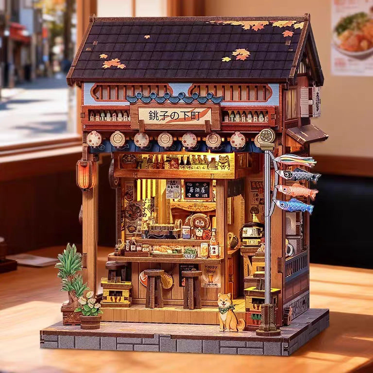 Book nook izakaya éclairé sur une table près d'une fenêtre
