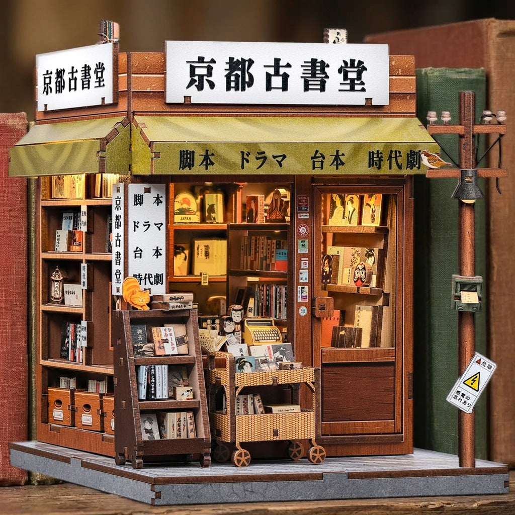 Book nook librairie ancienne japonaise rangé entre de vieux livres sur une étagère