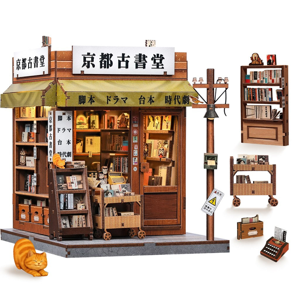Book nook librairie ancienne japonaise et ses accessoires : étagère, chariot, machine à écrire, chat
