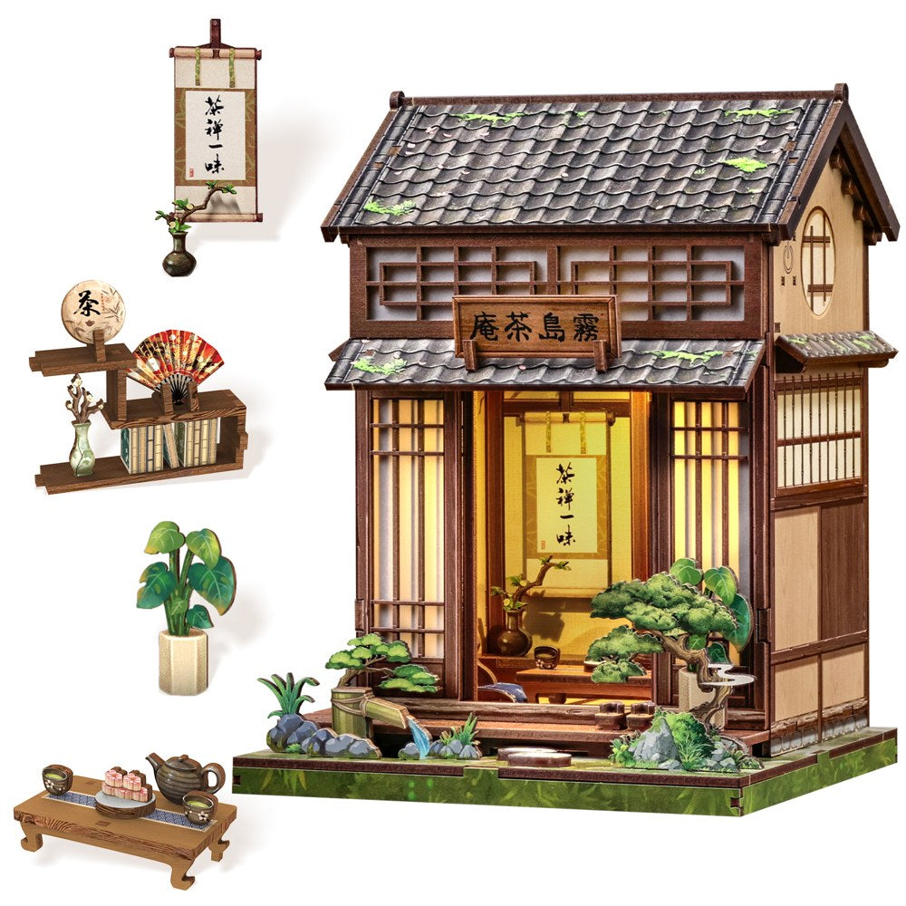 Book nook maison de thé japonaise et ses accessoires : rouleau, éventail, plante, table à thé